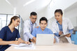 © SOMKID - Medical team brainstorming having a meeting in conference room at hospital, Medical technology and health care concept.
