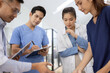 © SOMKID - Medical team brainstorming having a meeting in conference room at hospital, Medical technology and health care concept.