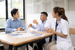 © SOMKID - Medical team having a meeting in conference room at hospital, Medical technology and health care concept.