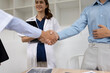 © SOMKID - Doctors shaking hands in meeting room at hospital , Healthcare and medical concept.