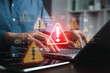© ภาคภูมิ ปัจจังคะตา - Cyber security risk concept, system alert on interface, hacking, IT system breach, AI-powered security alert.