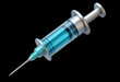 © MdAshraf - Medical syringe with blue liquid isolated on transparent background
