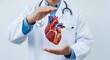 © IMAGE STORE - Doctor holding a realistic human heart with care and protection