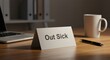 © Volha - Desk with 'Out Sick' sign, black pen, mug, and laptop in quiet office environment, conveying absence due to illness and professional workspace