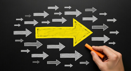 Poster - Yellow arrow drawn on blackboard surrounded by gray arrows, symbolizing leadership, unique vision, and standing out from the crowd in business strategy