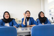 © ADDICTIVE STOCK - Asian students in classroom wearing uniform and hijab