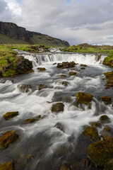 Canvas Print - scenic view of fossalar waterfall in iceland in summer time.