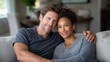 © Nataliya - Peaceful Abiracial Couple Relaxing Together in Living Room