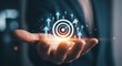 © GFX Corner - A businessman presents a target with upward arrows, symbolizing business goals and success strategy