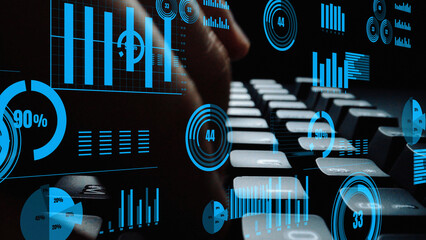 Poster - This image depicts a hand poised over a keyboard, surrounded by dynamic digital graphs and charts, embodying the fusion of technology and data analysis in a modern workspace. Xenic