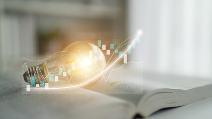 Poster - A light bulb representing innovation shines on an open book, enhanced by stock market graphs, symbolizing creativity and analysis in a modern work environment. Impute