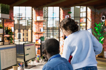 Poster - Call center supervisor checking progress done by workers investigating lost customer packages in office. Customer support manager supervising staff members using software to locate clients packages