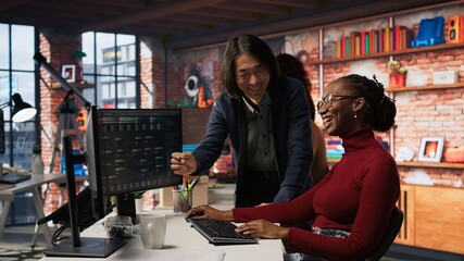 Aufkleber - Artificial intelligence startup company manager overseeing programmer building application. Asian team leader assisting worker in AI software development agency, offering advice, camera A