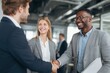 © LimeSky - Professionals shaking hands post interview in an office