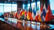 © See - International flags lined up on wooden table in conference room