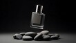 © RandikaM - A clear perfume bottle with a black cap hovering above smooth gray stones on a dark background
