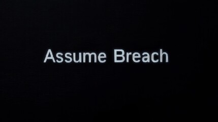 Poster - Zero Trust Concepts. Assume Breach text on a dark background, suggesting security themes or cyber threats.