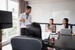 © Charlie's - Diversity Woman leadership asian business people training Teamwork meeting asian employees working together colleagues