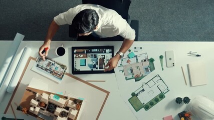 Poster - Time lapse of smart civil engineer sitting and writing idea while looking at house model. Aerial view of architect or designer planning and thinking about creative building construction. Alimentation.