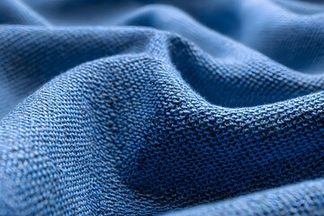Blue sports fabric texture background, close-up of blue jersey cloth