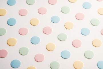 Poster - Pastel polka dots arranged in a seamless pattern on white textured paper background creating a playful light minimalistic design concept for graphics. Ai generative