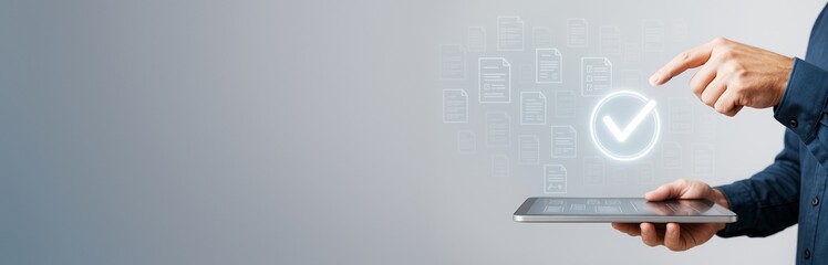 Poster - Businessman using digital tablet with virtual document approval icon on modern light background, concept of online validation and digital technology.