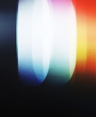 Poster - Abstract light leak effect for graphic design. Vertical bright flares and colorful streaks on dark backgrounds. Creative photography overlay for a subtle aesthetic.