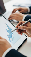 Aufkleber - Close-up of hands using stylus on tablet displaying blue graph, showcasing business analysis, data review, and strategic planning concepts