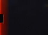 Super 8 film frame background showing light leaks and scratches