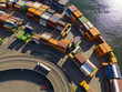 © AmazingAerialAgency - Aerial view of a vibrant array of stacked shipping containers at the port, contrasting with the dark water and the curving road below, Oslo, Norway.