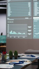 Poster - Vertical Video Empty space in a multinational company showcases data insights late at night, forecasting important performance metrics on display in a dark office boardroom. Management project agenda.