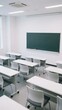 © ba - Empty Classroom with White Desks and Green Chalkboard