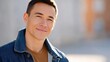 © Nitchalee N. - Peer to peer crypto payment, A smiling man in a denim jacket, exuding warmth and confidence against a softly blurred background.