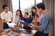 © Pichsakul - Asian Business Professionals Colleagues Experience Extreme Stress Frustration Problem Solving Difficult Project Issues Overwhelming Challenge During Intense Meeting