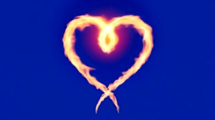Wall Mural - a glowing heart shape created with flames against a deep blue sky, symbolizing love and passion