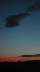 Wall Mural - crescent young moon with stars, planets and rural countryside tree silhouettes.