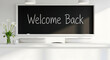 © malik studio - Classroom with welcome back chalkboard and white orchids ai generated