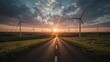 © ahmad - Road to Renewable Energy: Wind Turbines at Sunset with Dramatic Sky