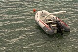 Inflatable small motorboat off the coast of Rab, Croatia.