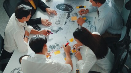Poster - Group of diverse team planning strategy while sitting at table with project plan. Top aerial view of smart business people working together to brainstorm and design house construction. Alimentation.