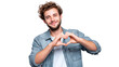 © CStock - Young man showing heart shape with hands, smiling, white isolated background.