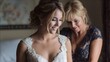 © JoaoNalio - The bride and her mother share a tender moment of preparation.