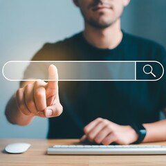 Man interacting with search bar on computer symbolizing information retrieval and internet browsing experience focused on user interface and digital interaction