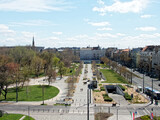 Urban park and boulevard scene in Budapest, Hungary with historic architecture and spring trees