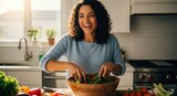Woman joyfully making a salad in a kitchen