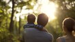 © LU - Small family enjoying a peaceful summer forest scene with warm sunlight filtering through trees.