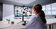 © Andrey Popov - Female Executive Conducting Virtual Webinar Meeting