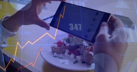 Hands grabbing smartphone, adjusting angles and framing avocado toast while displaying data charts
