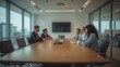 © AkuAku - Soft-focus image of a meeting area within a stylish office environment - suitable for presentation visuals.