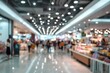 © Ummu - Blurred view of a busy shopping mall interior
